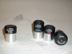 A collection of 11  eyepieces